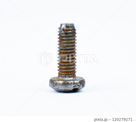 A rusty metal bolt stands upright A rusty metal bolt stands upright 120279271