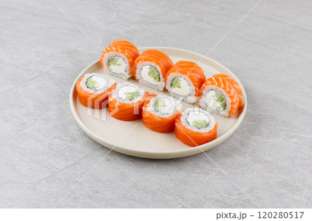 Japanese Sushi Rolls Philadelphia Uramaki Plate on Gray Background for Restaurant Menu or Food Delivery Japanese Sushi Rolls Philadelphia Uramaki Plate on Gray Background for Restaurant Menu or Food Delivery 120280517