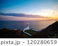 灯台のある岬の夕焼け 120280659