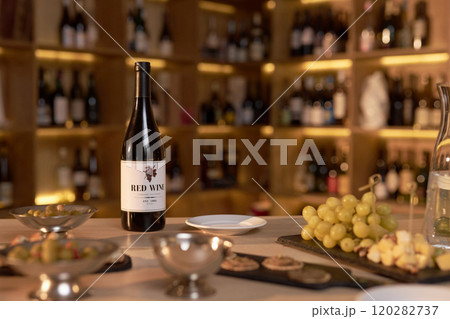 Medium close up of degustation set prepared for red wine tasting on table in wine cellar 120282737