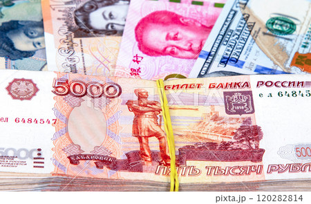 Five thousandths banknotes of russian rubles against the background of money of various states 120282814