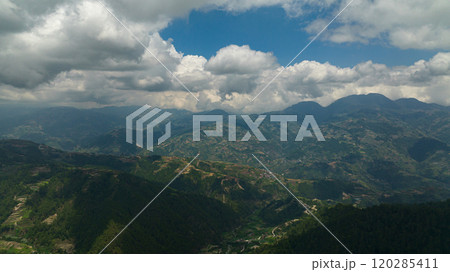 Top view of rice terraces and agricultural land on hillsides in a mountainous province. Philippines, Luzon. Top view of rice terraces and agricultural land on hillsides in a mountainous province. Philippines, Luzon. 120285411