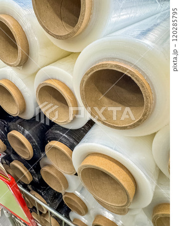 Stacked Industrial Plastic Wrap Rolls for Packaging and Shipping Supplies . High quality photo Stacked Industrial Plastic Wrap Rolls for Packaging and Shipping Supplies . High quality photo 120285795