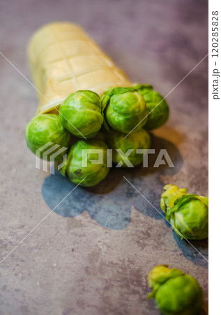 Creative Brussels Sprouts in Waffle Cone - Unique Healthy Food Concept. High quality photo Creative Brussels Sprouts in Waffle Cone - Unique Healthy Food Concept. High quality photo 120285828
