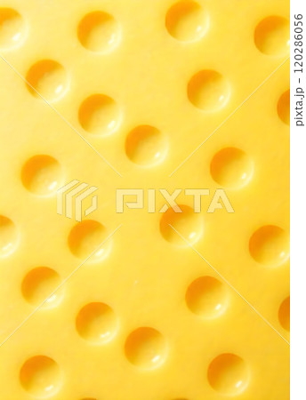 Close-up gourmet emmental cheese slice 120286056