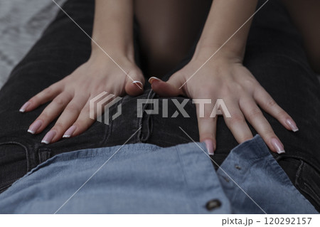 Work with your mouth. Sexy girl rubs the zipper on her partner's jeans for oral sex Work with your mouth. Sexy girl rubs the zipper on her partner's jeans for oral sex 120292157