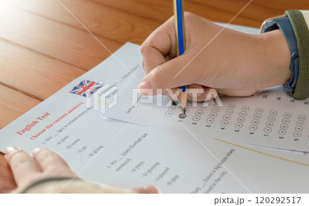 English test and bubble answer sheet on table in class 120292517