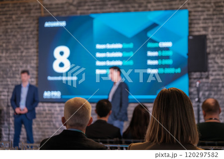 Business presentation with digital screen in modern setting Business presentation with digital screen in modern setting 120297582