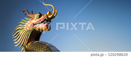 Chinese New Year Dragon Decoration on blue sky background.Chinese sculpture designs.Dragon head.Happy New Year.Dragon Decoration on festive background. 120298620