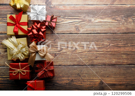 Assorted artisanal gift boxes on wooden background. Assorted artisanal gift boxes on wooden background. 120299506