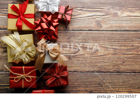 Assorted artisanal gift boxes on wooden background. Assorted artisanal gift boxes on wooden background. 120299507