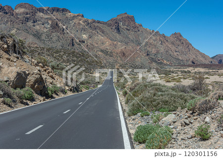 Mountain landscape. Road in a mountainous area at the foot of the mountain Mountain landscape. Road in a mountainous area at the foot of the mountain 120301156