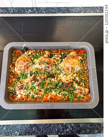 Indian chicken curry with rice in supermarket packaging tray 120302144