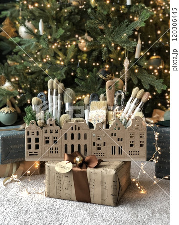 gingerbread in the form of a house decorated with gifts 120306445