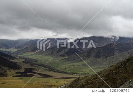 Chike-Taman pass in Altai mountains. Mountain landscape in the Altai Republic, Autumn mountains with green and yellow trees. Autumn landscape Chike-Taman pass in Altai mountains. Mountain landscape in the Altai Republic, Autumn mountains with green and yellow trees. Autumn landscape 120306742