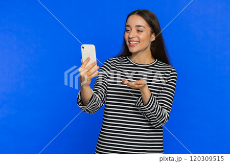 Happy woman blogger take portrait selfie record video call online with social media subscribers 120309515
