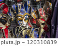 A close-up view of several ornate Venetian carnival masks 120310839