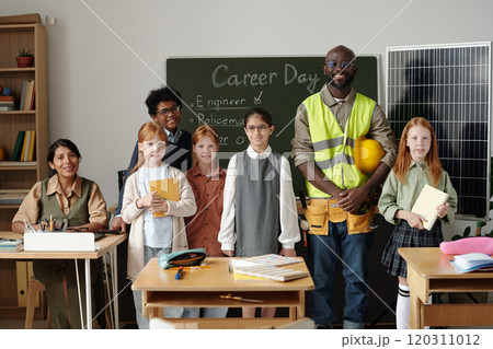 Schoolkids, their teacher and engineer 120311012