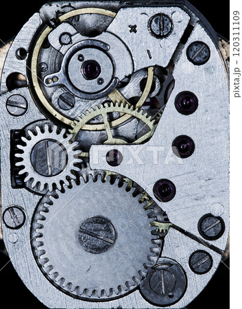 old mechanism on background of old metal cogwheels old mechanism on background of old metal cogwheels 120311109