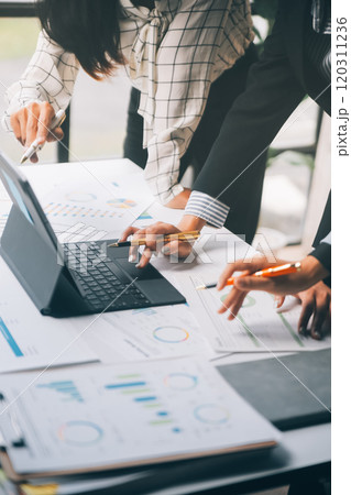 Fund managers team consultation and discuss about analysis Investment stock market at office 120311236