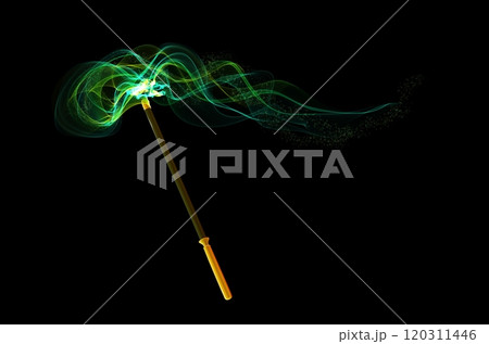 Realistic magic wand and and enchanted green lights. Multicolored glowing plume of smoke, black abstract tansparent effect. Cartoon sorcery stick isolated. Celebration symbol. Realistic magic wand and and enchanted green lights. Multicolored glowing plume of smoke, black abstract tansparent effect. Cartoon sorcery stick isolated. Celebration symbol. 120311446