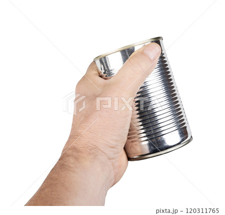 a metal food jar in the hand 120311765