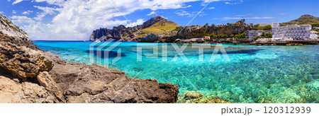 Amazing best beaches of Mallorca (Majorca) island. Cala Clara in northern part. panorama of beautiful bay and turquoise clear sea. Spain, Balearic islands Amazing best beaches of Mallorca (Majorca) island. Cala Clara in northern part. panorama of beautiful bay and turquoise clear sea. Spain, Balearic islands 120312939
