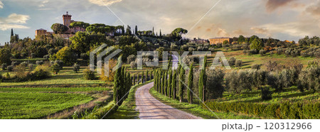 Italy, romantic Tuscany scenery with cypresses and castles. famous region Val d'orcia (Orcia valley) over sunset Italy, romantic Tuscany scenery with cypresses and castles. famous region Val d'orcia (Orcia valley) over sunset 120312966