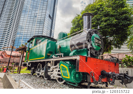 Vintage train on the background of skyscrapers in Malaysia Kuala Lumpur 120315722