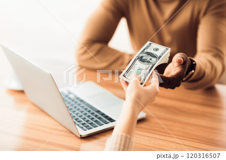 Bribery Concept. Corrupted unrecognizable african businessman receiving money from partner. Copy space Bribery Concept. Corrupted unrecognizable african businessman receiving money from partner. Copy space 120316507