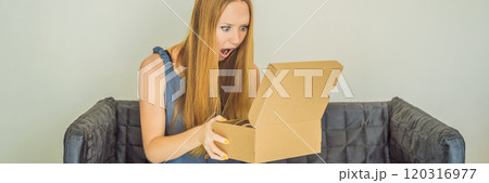 young woman received online shopping parcel opening boxes and buying fashion items by using credit card BANNER, LONG FORMAT young woman received online shopping parcel opening boxes and buying fashion items by using credit card BANNER, LONG FORMAT 120316977