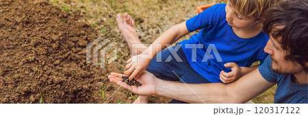 Father and son gardening in the garden near the house BANNER, LONG FORMAT Father and son gardening in the garden near the house BANNER, LONG FORMAT 120317122
