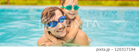 Dad and son in swimming Goggles have fun in the pool BANNER, LONG FORMAT Dad and son in swimming Goggles have fun in the pool BANNER, LONG FORMAT 120317194