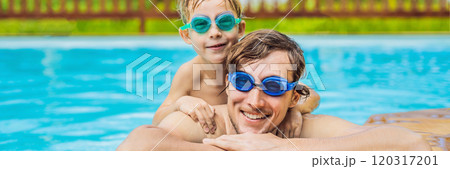 Dad and son in swimming Goggles have fun in the pool BANNER, LONG FORMAT 120317201