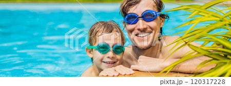 Dad and son in swimming Goggles have fun in the pool BANNER, LONG FORMAT Dad and son in swimming Goggles have fun in the pool BANNER, LONG FORMAT 120317228