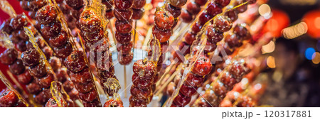 Traditional Chinese Dessert - Candied Fruit on a Wooden Stick BANNER, LONG FORMAT 120317881
