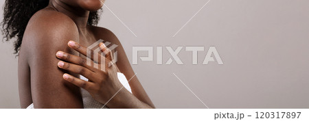 Cropped Image Of Young African American Female Touching Her Silk Soft Skin, Black Woman Enjoying Body Treatments And Self Care, Standing Wrapped In Towel On Grey Background, Panorama, Copy Space Cropped Image Of Young African American Female Touching Her Silk Soft Skin, Black Woman Enjoying Body Treatments And Self Care, Standing Wrapped In Towel On Grey Background, Panorama, Copy Space 120317897