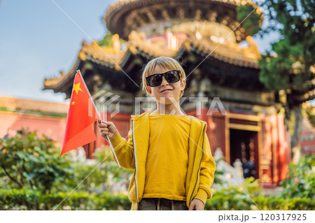 Enjoying vacation in China. Young boy with national chinese flag in Forbidden City. Travel to China with kids concept. Visa free transit 72 hours, 144 hours in China 120317925