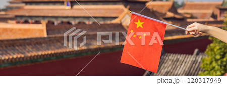 Enjoying vacation in China. Young woman with national chinese flag in Forbidden City. Travel to China concept. Visa free transit 72 hours, 144 hours in China BANNER, LONG FORMAT 120317949