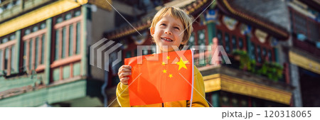 Enjoying vacation in China. Young boy with national chinese flag on the background of the old Chinese street. Travel to China concept. Visa free transit 72 hours, 144 hours in China BANNER, LONG 120318065