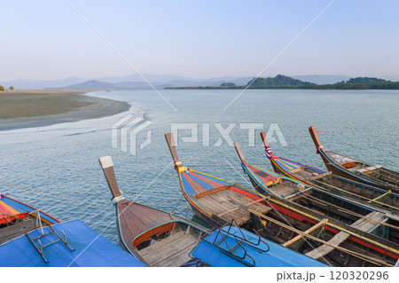 Close up Small fishing boats anchored in the sea 120320296