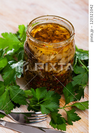 Herring preserves in glass jar 120321042