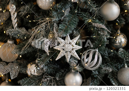 Gifts under the Christmas tree in the living room 120321331