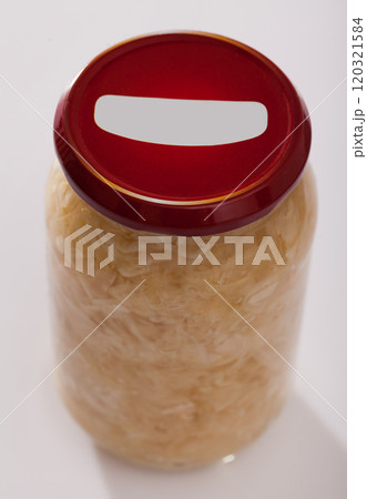 Glass jar of homemade pickled cabbage Glass jar of homemade pickled cabbage 120321584