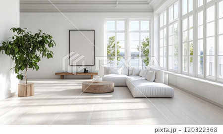 This modern living room features tall windows allowing natural light, a cozy white sectional sofa, a wooden coffee table, and greenery, creating a serene and inviting atmosphere for relaxation. 120322368