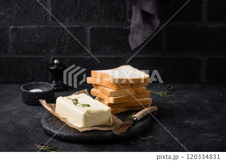 Fresh butter on grey backgrouns. 120334831