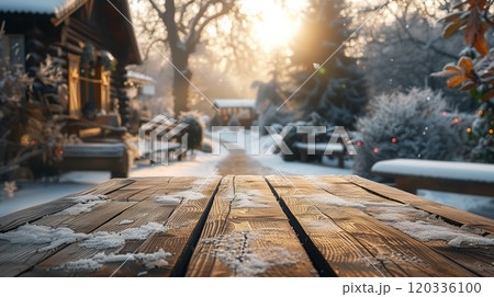 Empty tabletop at snowy winter village with sun rays, Generative AI 120336100