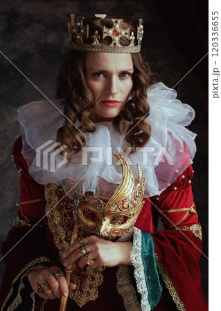 medieval queen in red dress with venetian mask medieval queen in red dress with venetian mask 120336655