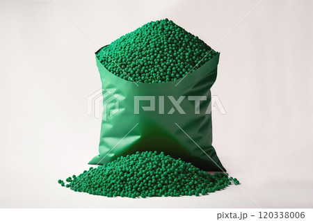 Bag with green biodegradable plastic granules. Isolated 120338006