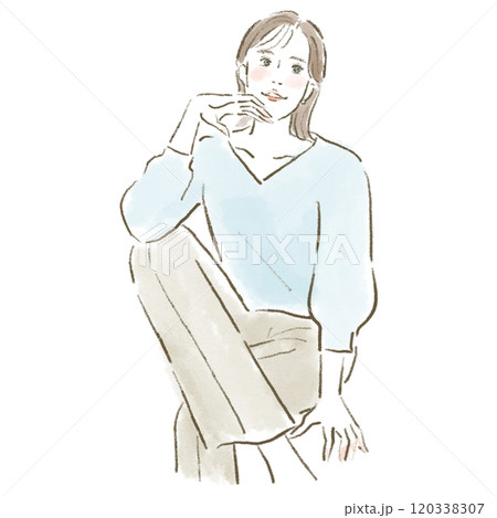 足を組んで座っている笑顔の若い女性 足を組んで座っている笑顔の若い女性 120338307